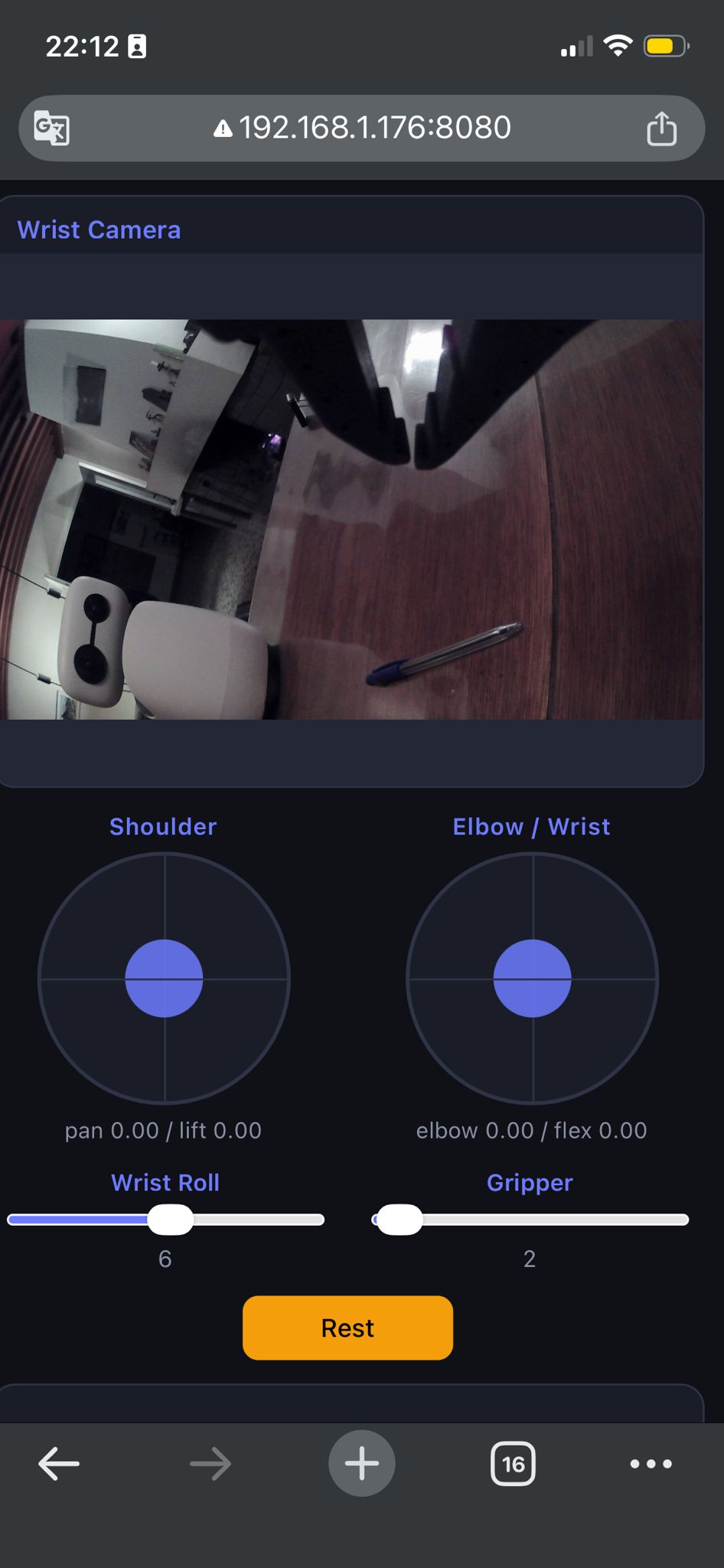 Teleoperation app on phone: wrist camera feed and joystick controls for shoulder, elbow, wrist, and gripper